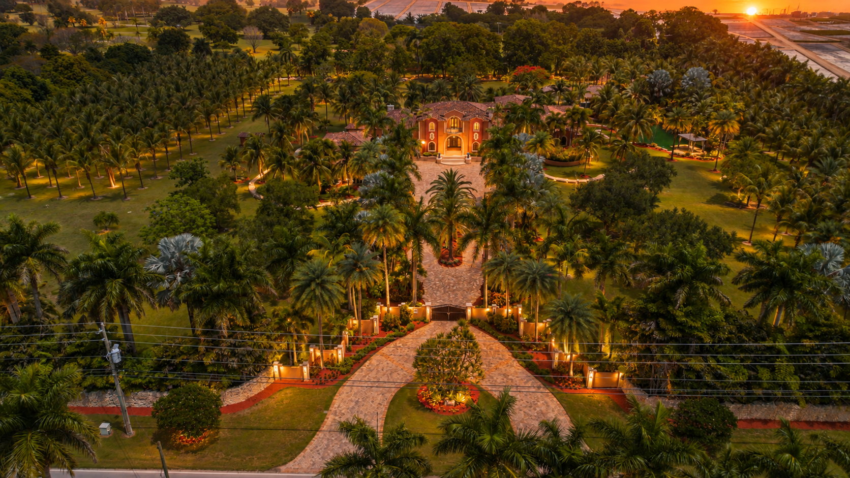 Aerial over the gated entry and residence